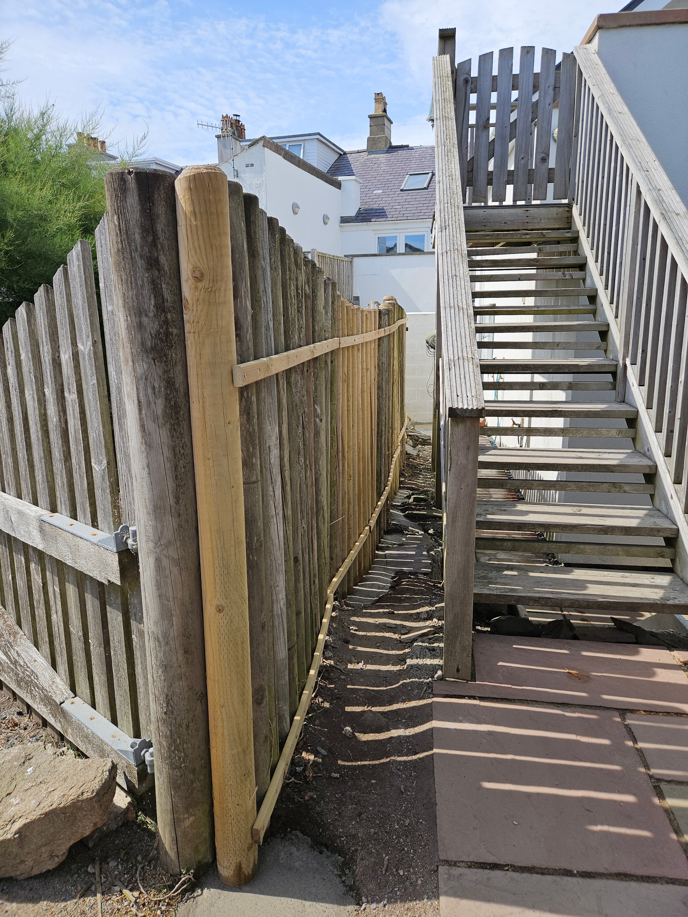 Completed fence repair on an Anglesey property — photo 1