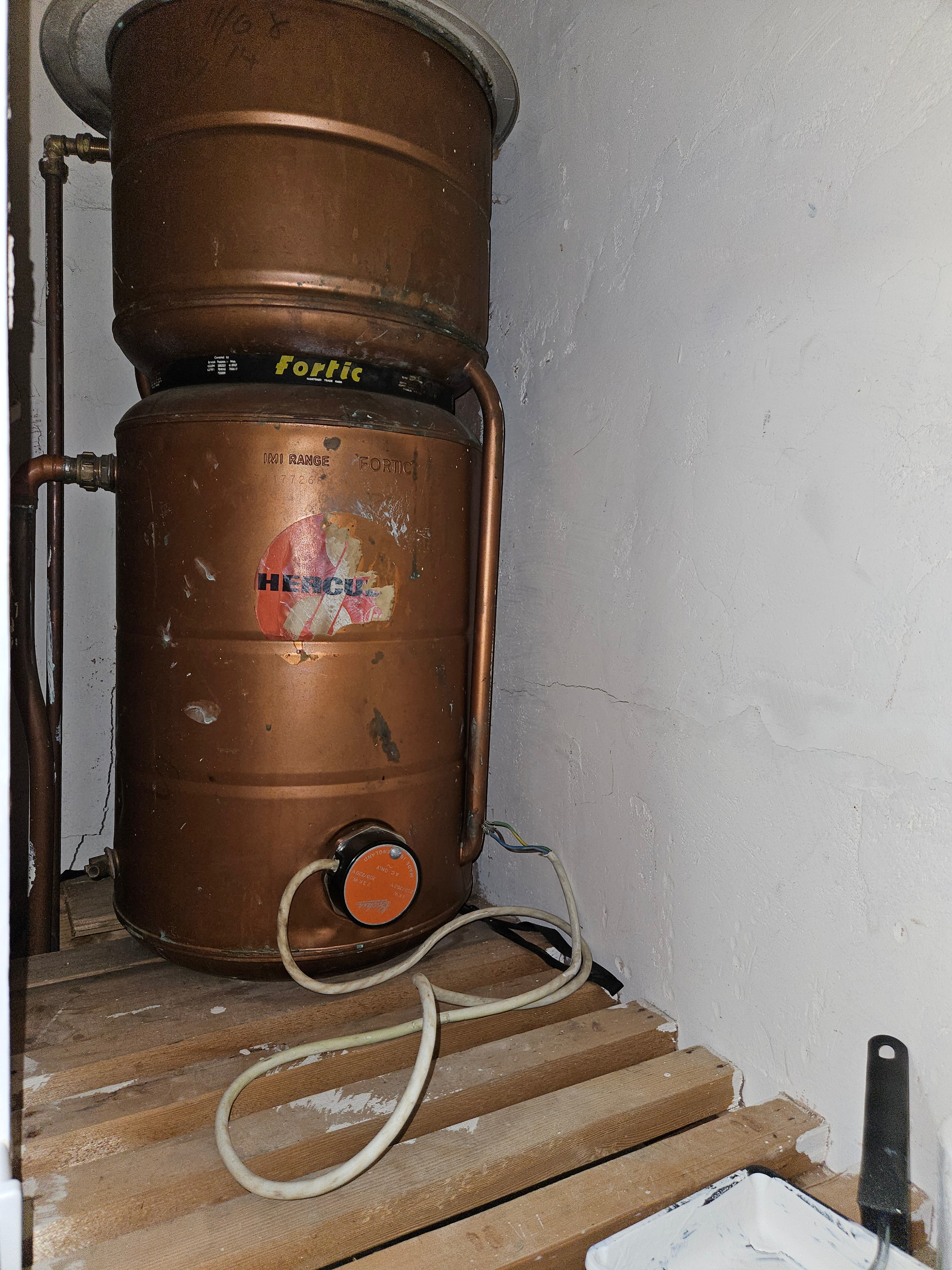Old copper Fortic tank — before plumbing work