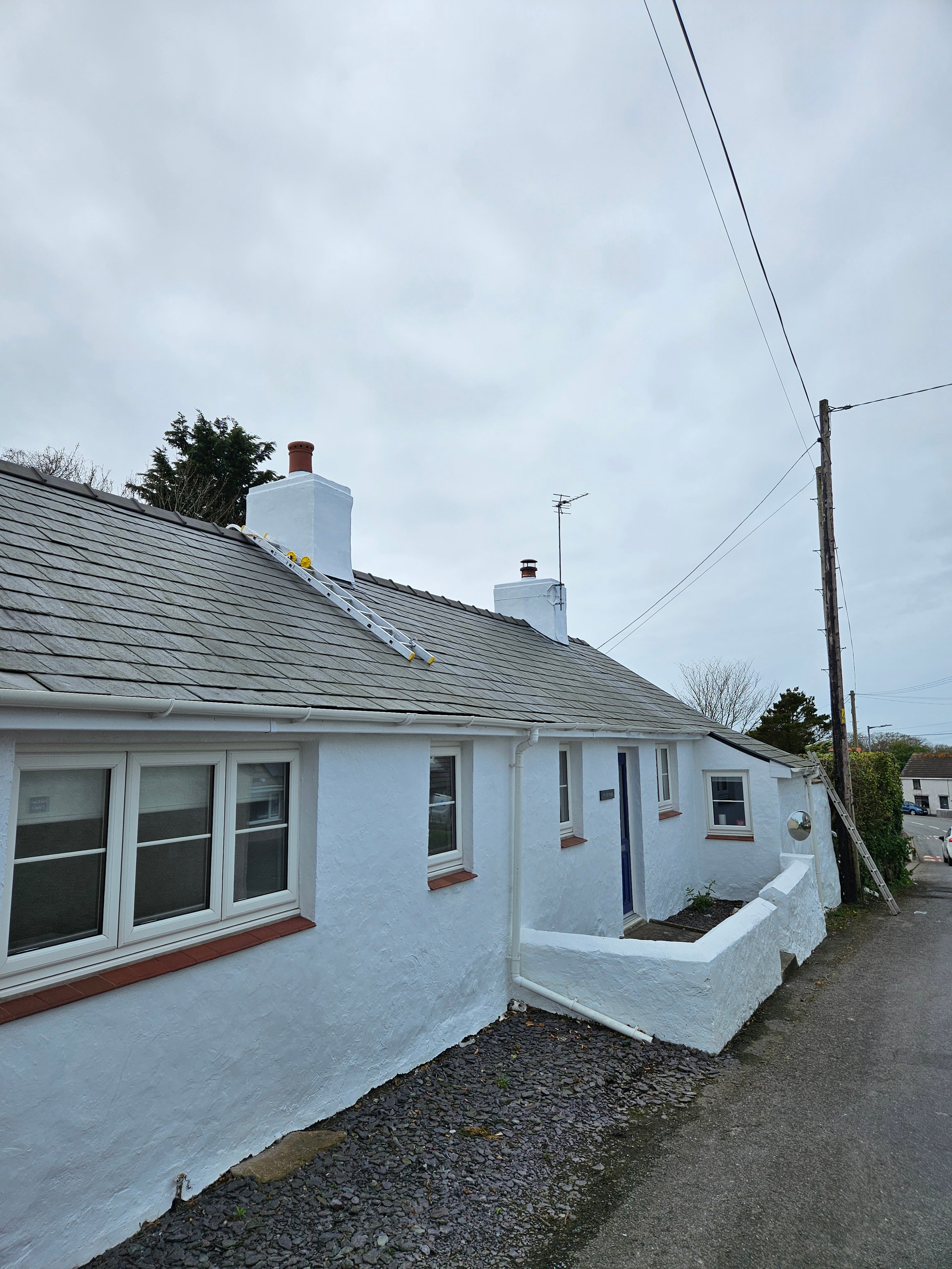 Completed exterior painting — angle view, Hermon