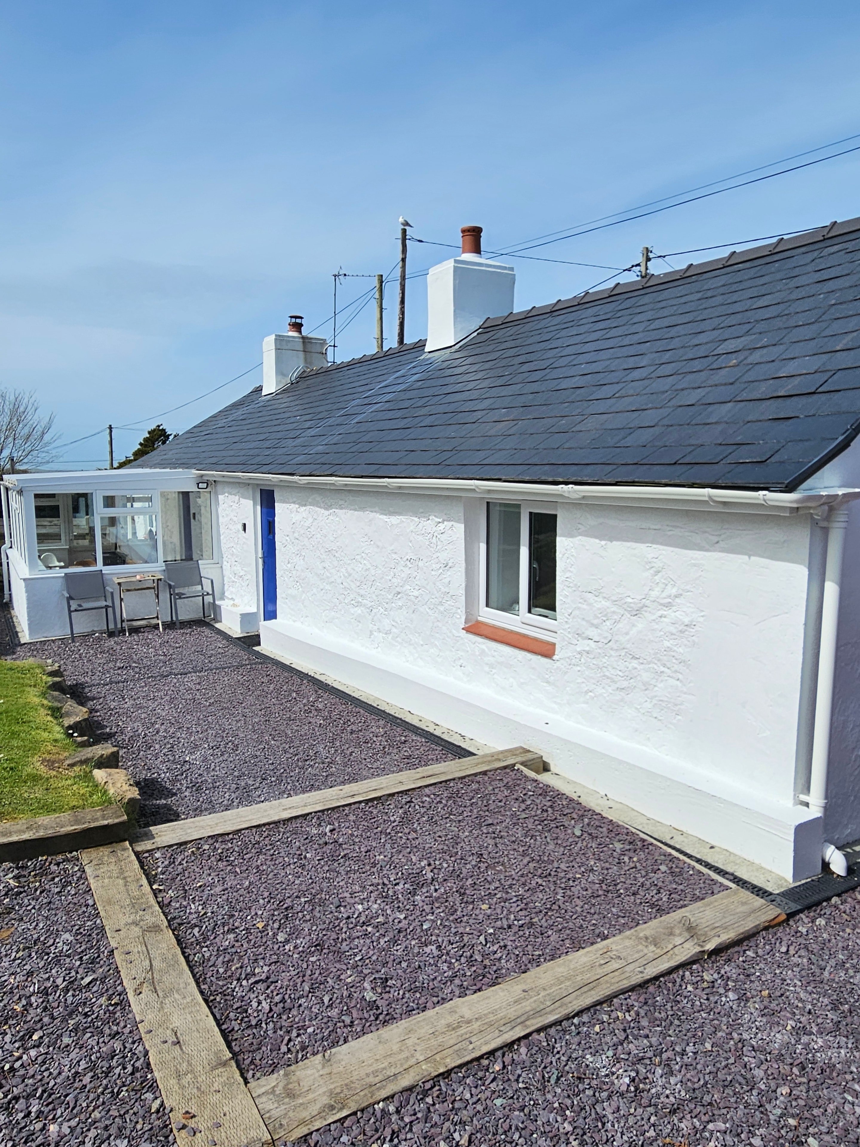 Completed exterior painting — front view, Hermon